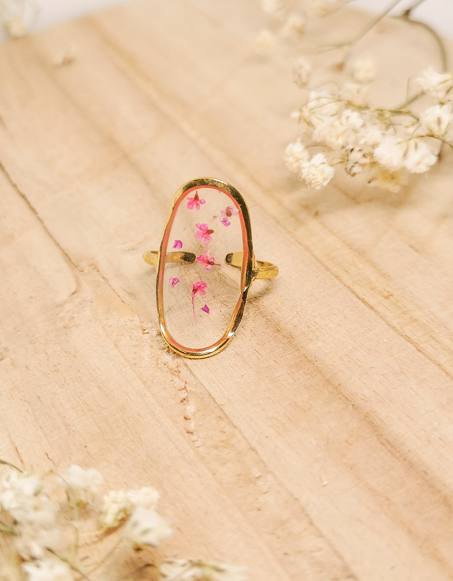 Bague transparente avec fleurs séchées