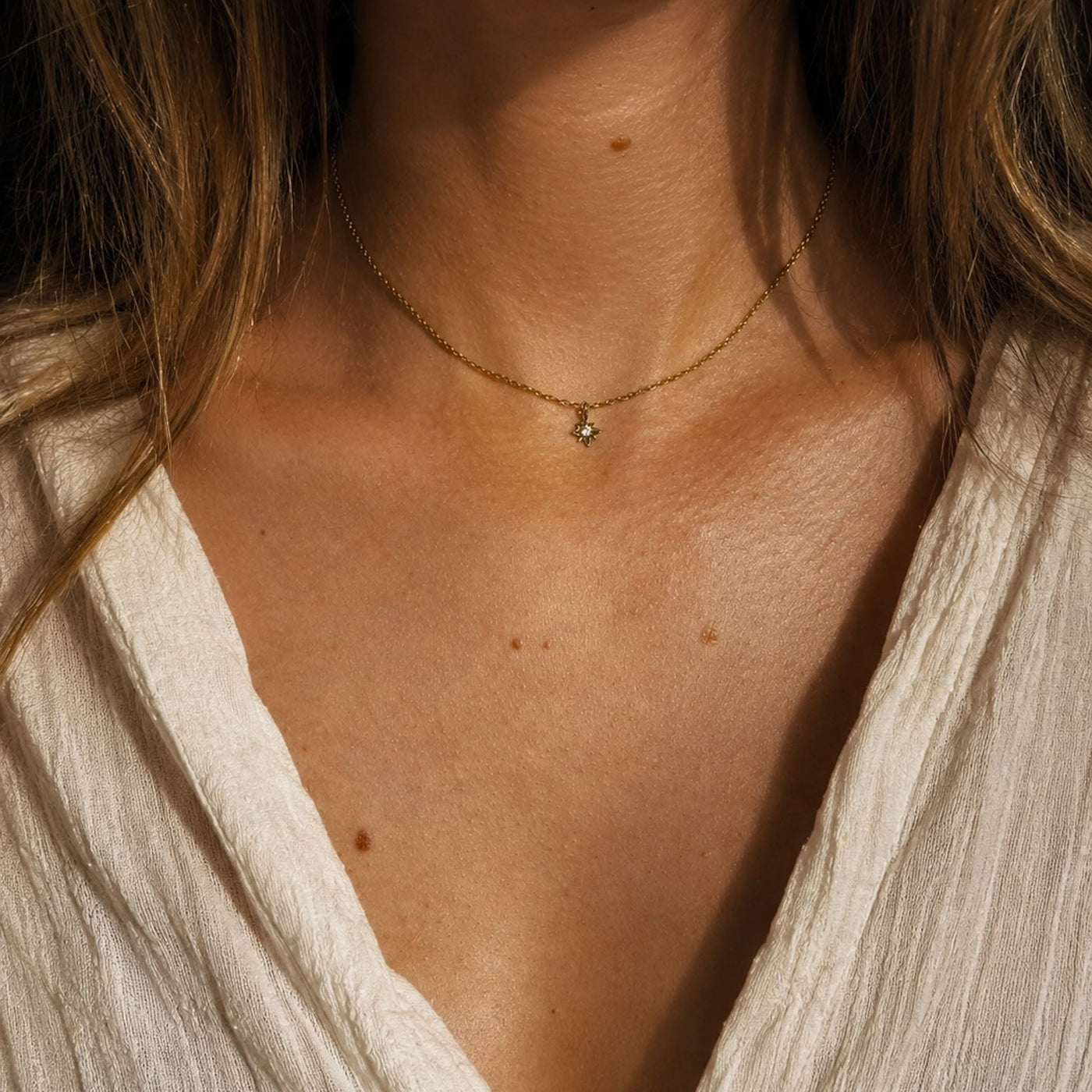 Collier Astren doré avec étoile et strass